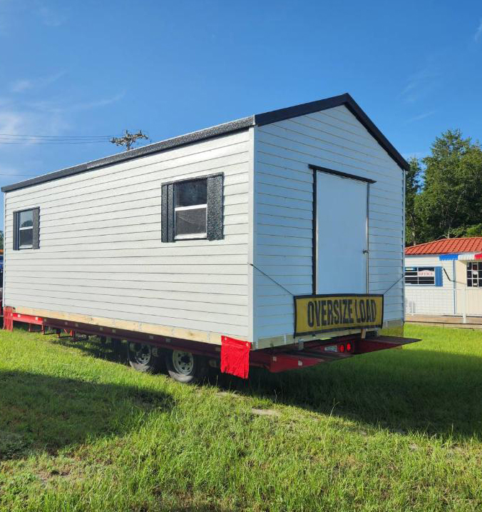Shed loaded on trailer for delivery