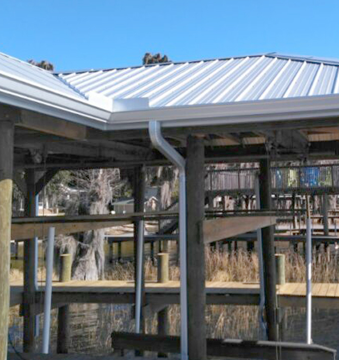 Dock with metal roof and gutters
