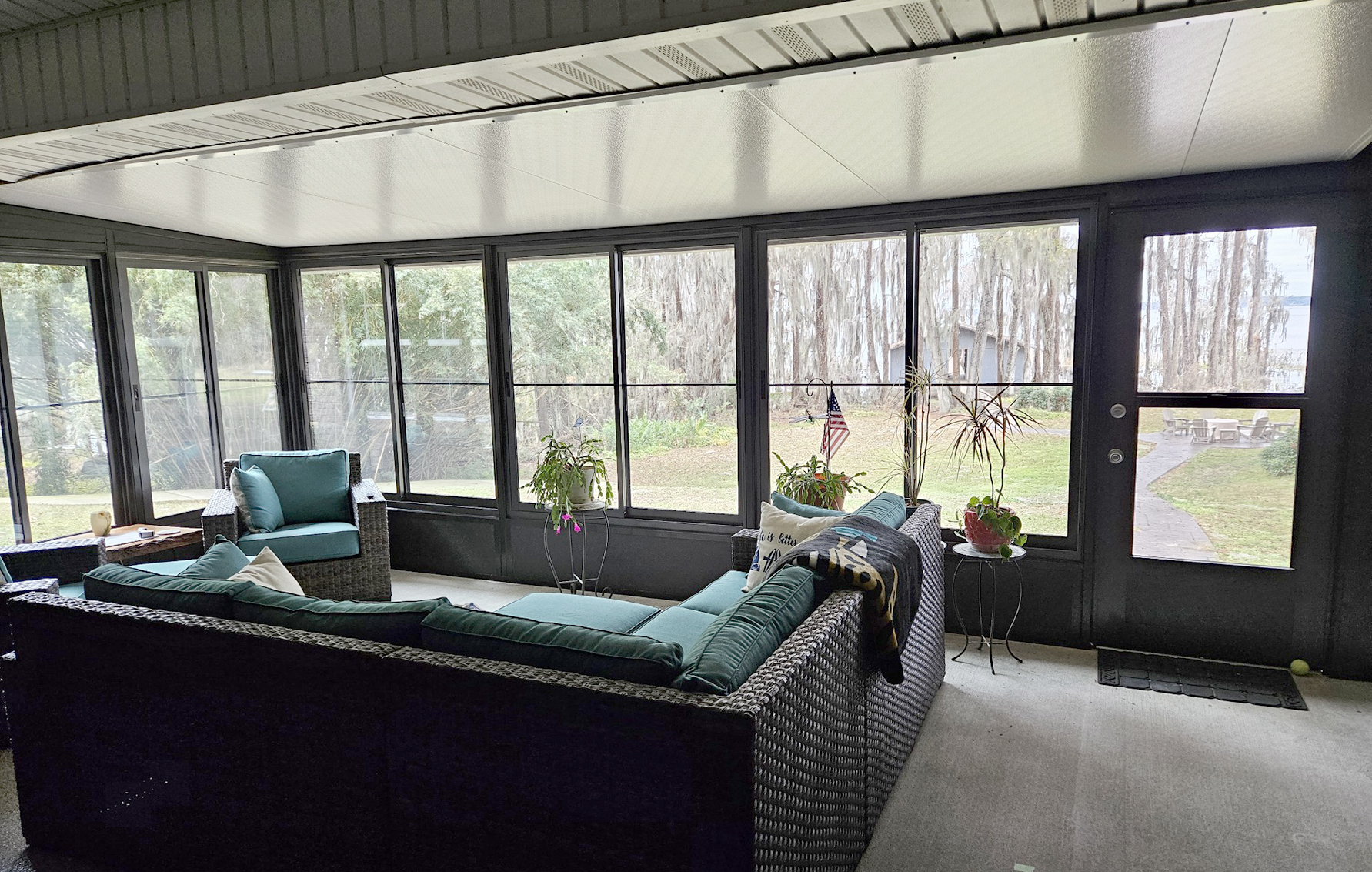 Couch in an enclosed screen porch