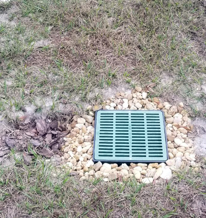 drainage grate on ground