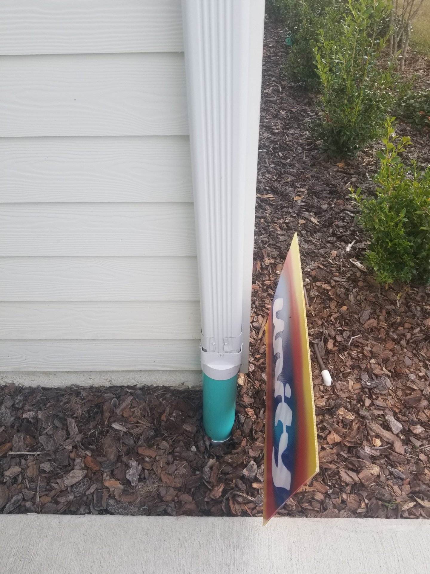 Gutter draining to an underground pipe