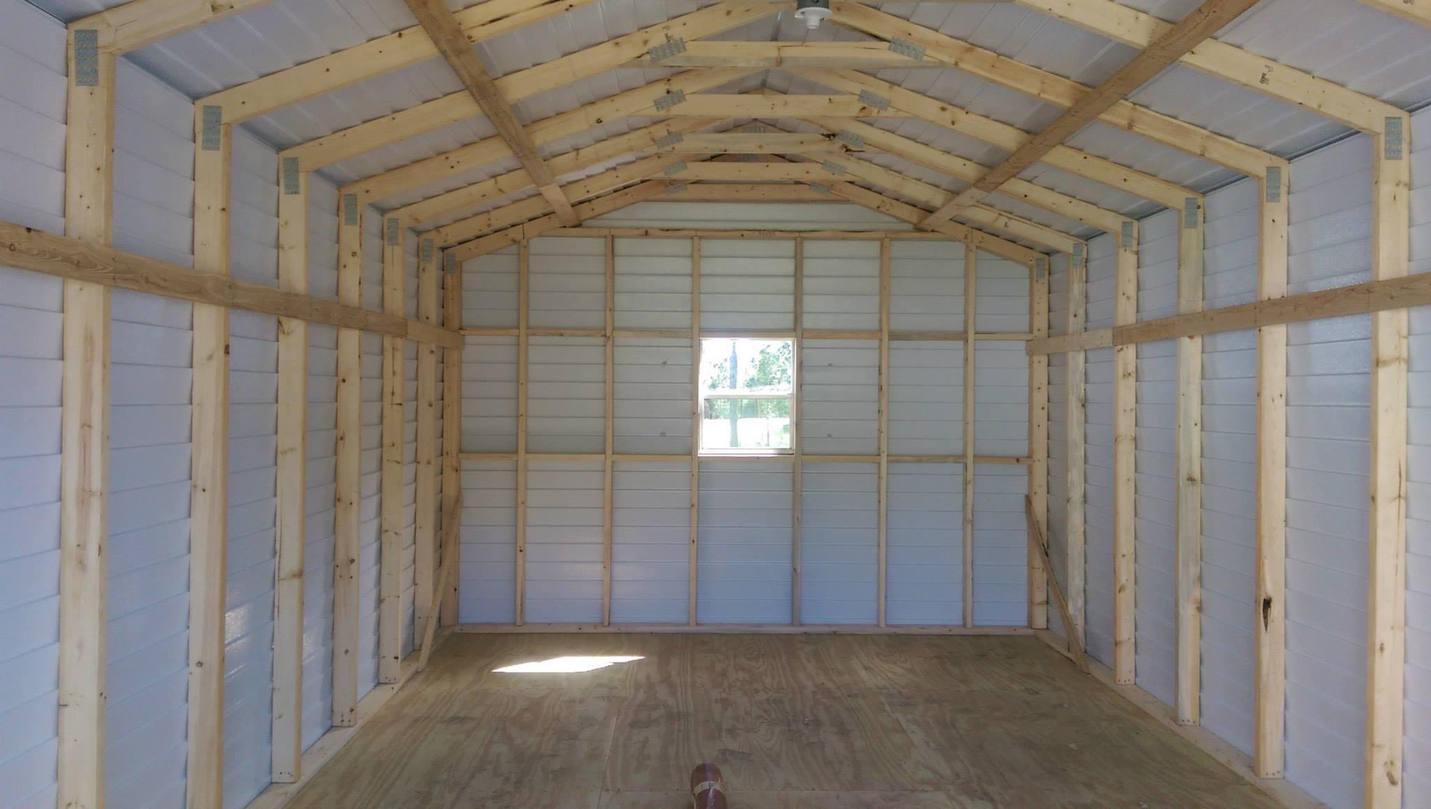 interior of a shed building showing wood framework